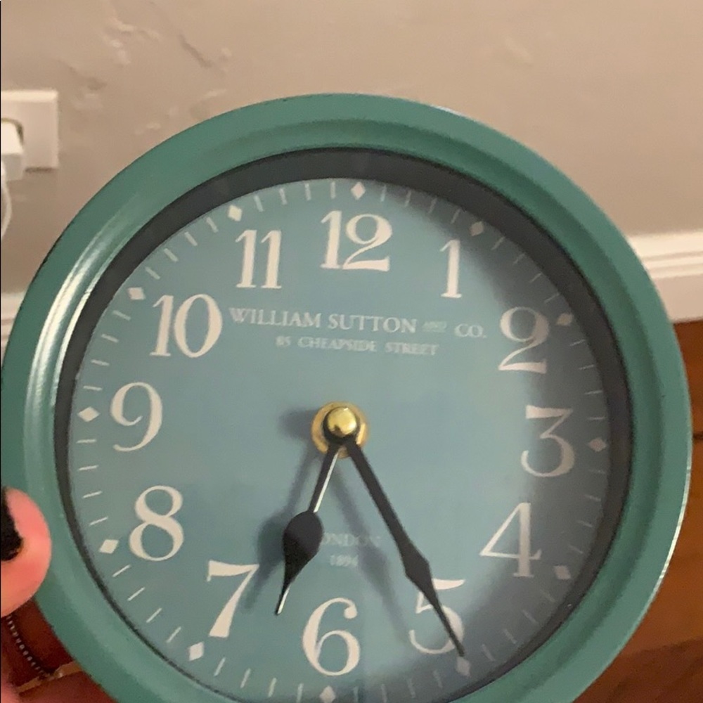 small teal clock